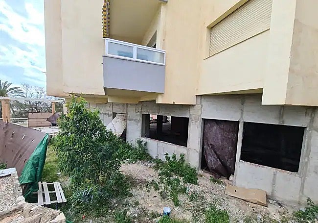 Squatters have moved into the lower floor of the building.