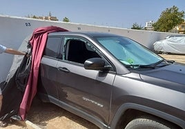 The car after it had been broken into and stolen.