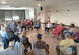 Age Concern clients participate in the seated vitality class.