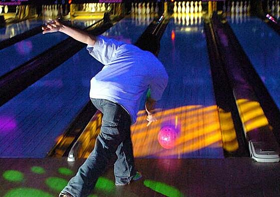 File image of a young person at a bowling alley.