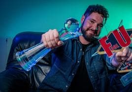 Magician Luis Olmedo shows off his new award