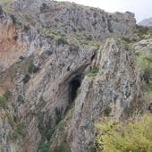 The Hundidero cave mouth from a nearby viewpoint (for scale note the roadway running just above it).