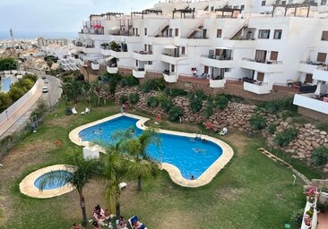 File image of a community swimming pool at a residential development in Nerja.