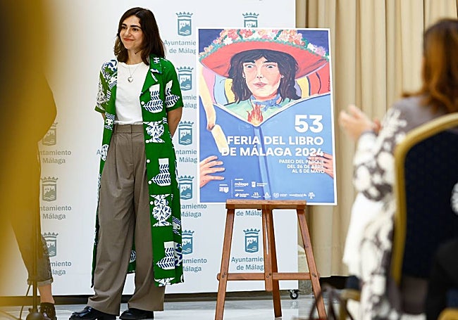 Patricia Paz, next to the poster she has designed for this 53rd edition of the Book Fair.