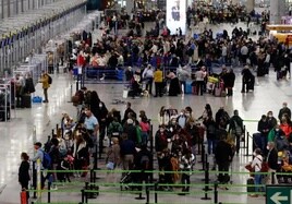 File image of queues at the check-in desks at Malaga Airport.