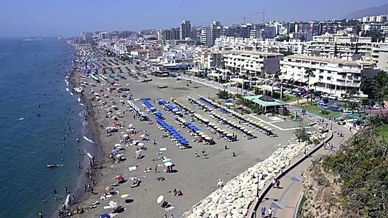Two trainee lifeguards, aged 12 and 14, help rescue tourists swept away by current on Costa del Sol beach