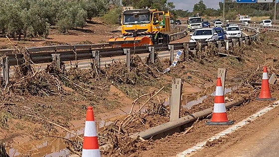 Granada province mops up after weekend rain and hail storm that flooded homes and roads and left one boy dead