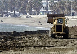 File photo of work to redistribute sand on a beach on the east side of Malaga city centre.
