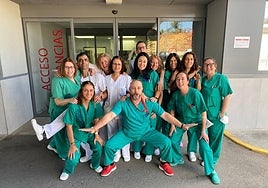 Paco, who paints under the name of Pacol, (centre) with some of his colleagues at the accident and emergency department of the Hospital de la Serranía de Ronda.