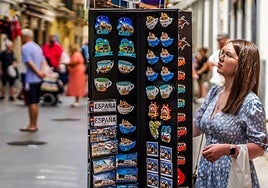 A tourist browsing for souvenirs in Cadiz