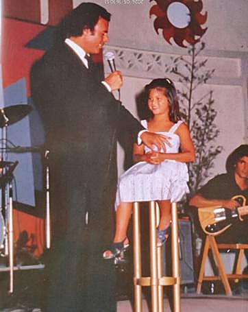 Julio Iglesias with his daughter on stage at Tivoli.