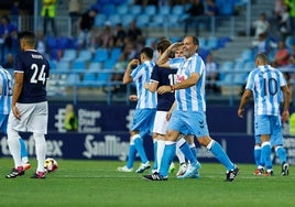 Salva salutes after scoring the equaliser, the last goal of the match.