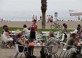 Worker at a beach bar in Malaga.
