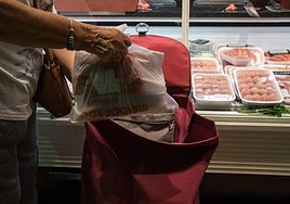 Shopping at the butchers.