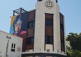 The Lennon mural overlooking the Plaza del Sol.