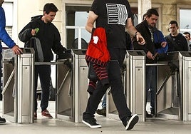 Workers, clocking in.