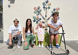 The manager of Ronald House in Malaga, with some of the children who are currently living there during their treatment.