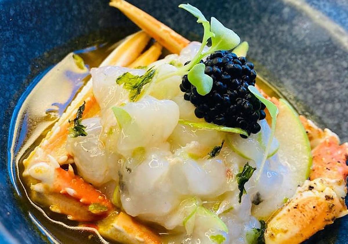 Langoustine tartar, herring caviar, apple and flambéed langoustine sauce and yuzu