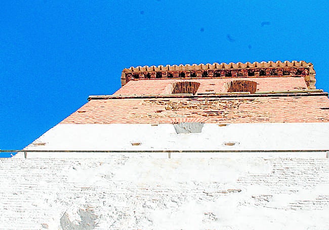 The upper part of the church tower has been free of whitewash for years.