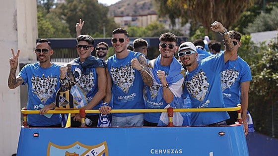 Fans celebrate Malaga CF's promotion as squad take open-top bus tour, in images