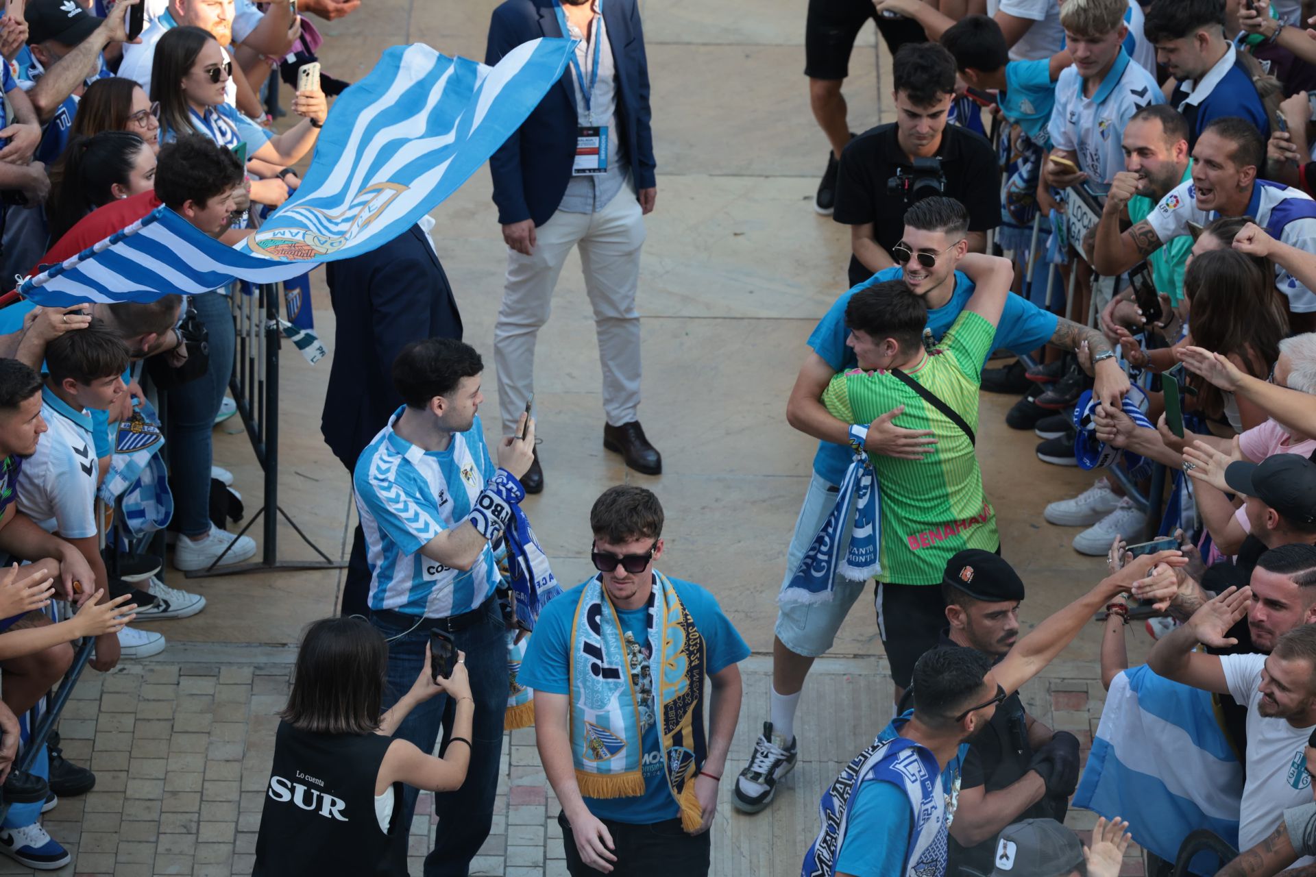 Fans celebrate Malaga CF's promotion as squad take open-top bus tour, in images