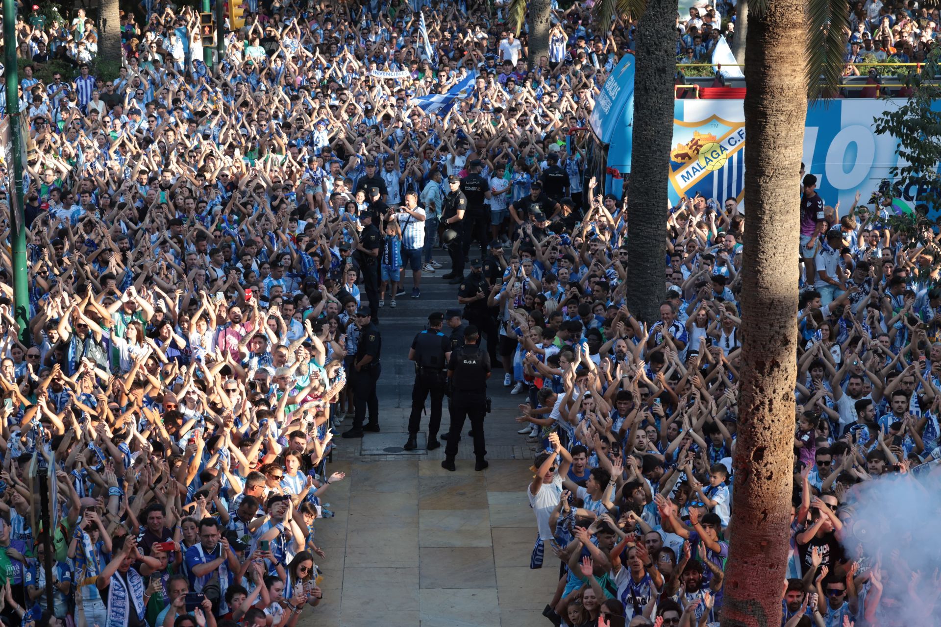 Fans celebrate Malaga CF's promotion as squad take open-top bus tour, in images