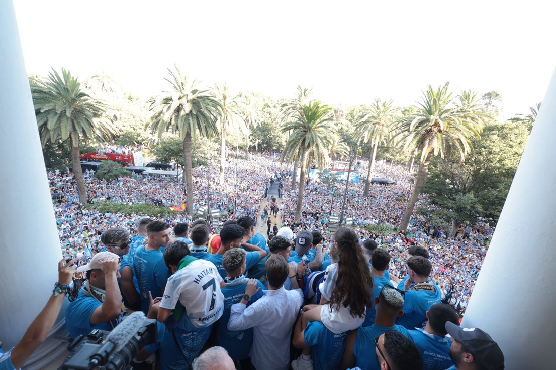 Fans celebrate Malaga CF's promotion as squad take open-top bus tour, in images