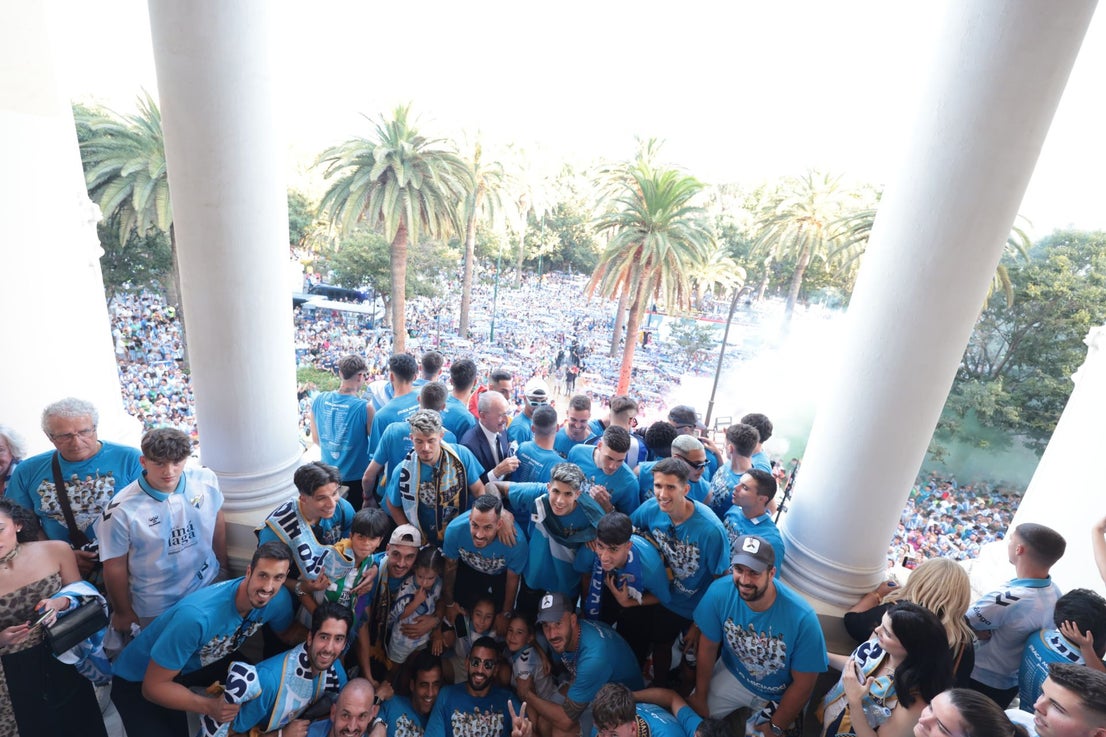 Fans celebrate Malaga CF's promotion as squad take open-top bus tour, in images