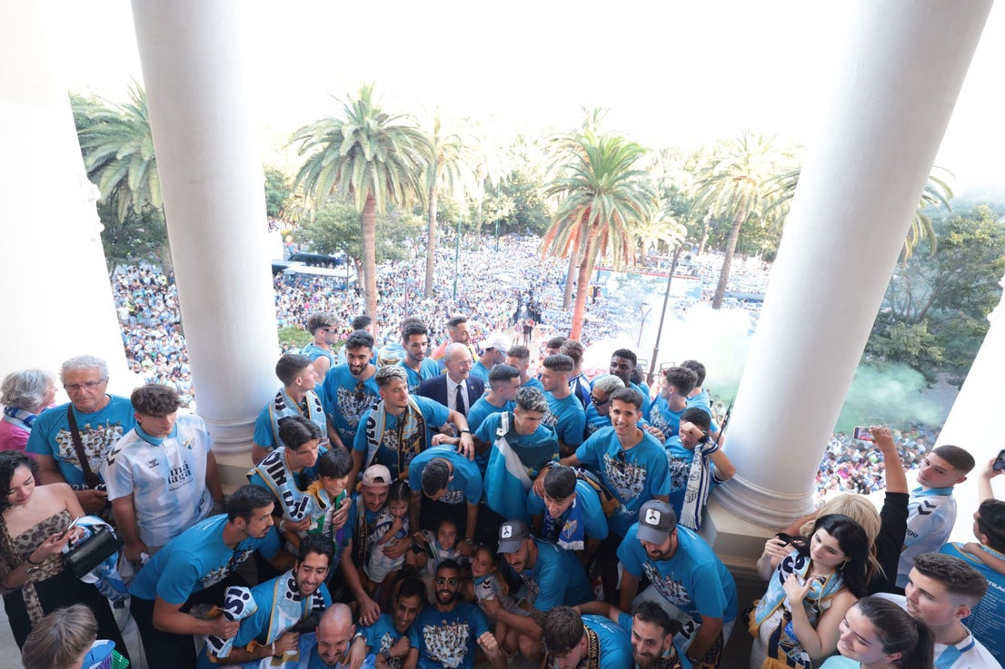 Fans celebrate Malaga CF's promotion as squad take open-top bus tour, in images