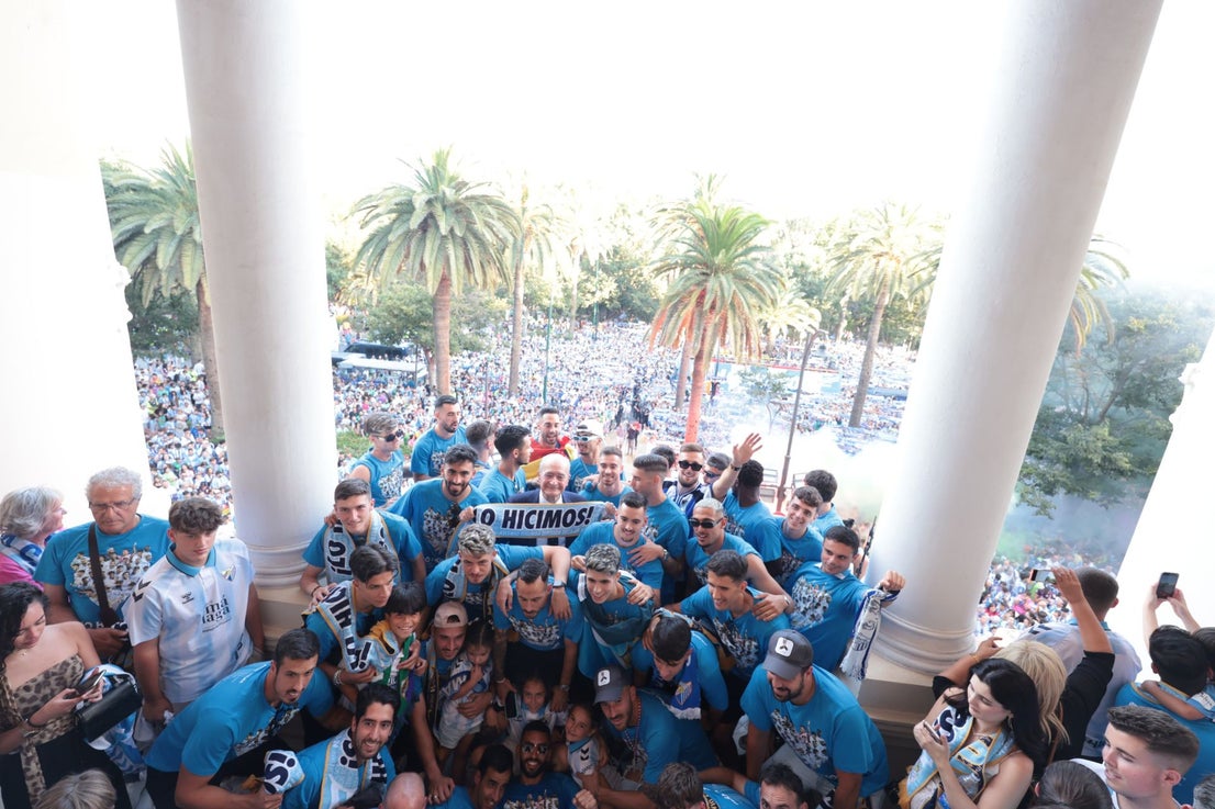 Fans celebrate Malaga CF's promotion as squad take open-top bus tour, in images