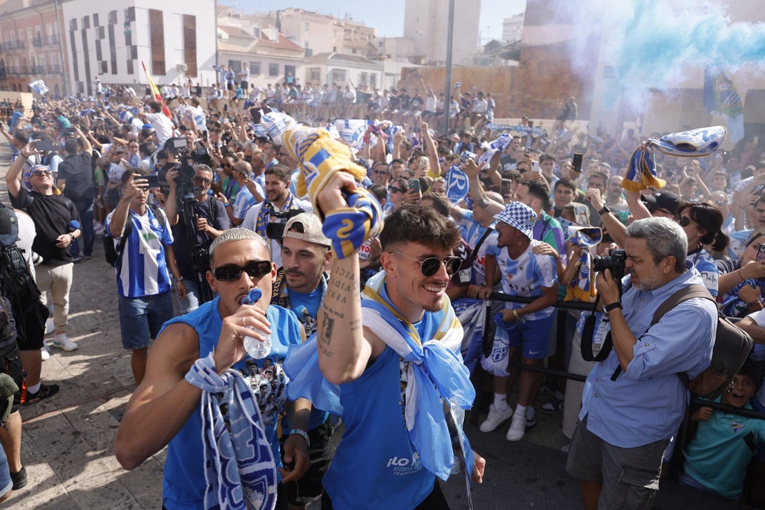 Fans celebrate Malaga CF's promotion as squad take open-top bus tour, in images