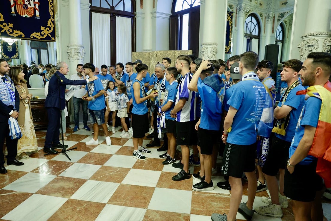Fans celebrate Malaga CF's promotion as squad take open-top bus tour, in images