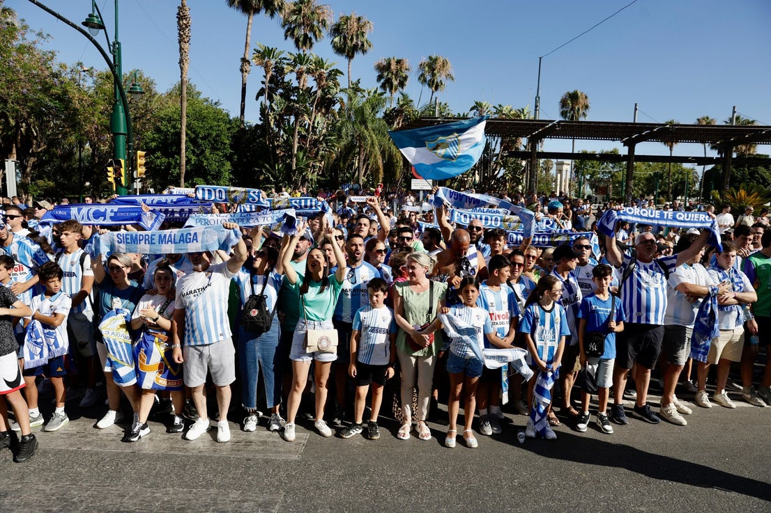 Fans celebrate Malaga CF's promotion as squad take open-top bus tour, in images