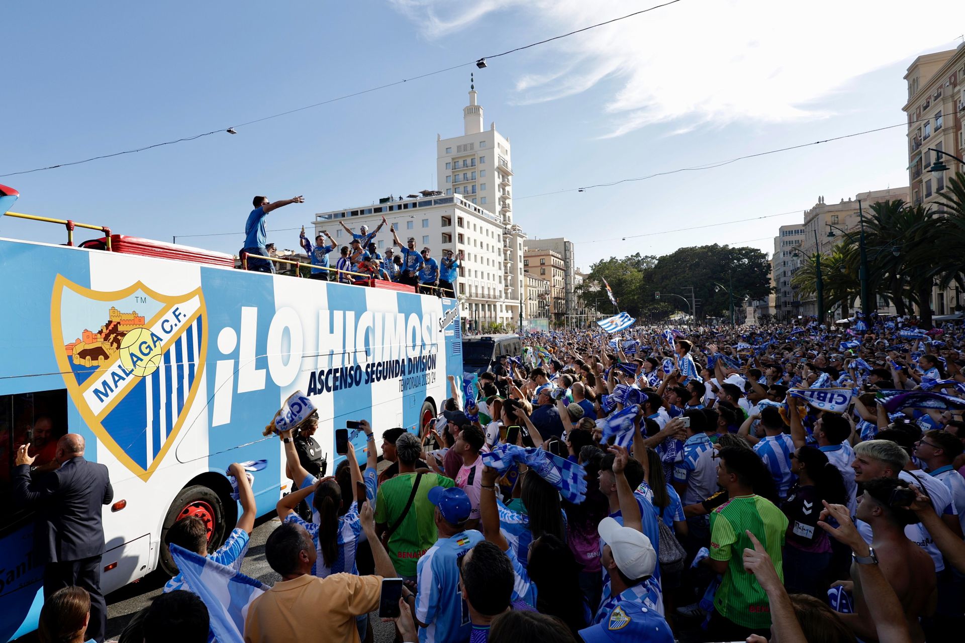 Fans celebrate Malaga CF's promotion as squad take open-top bus tour, in images