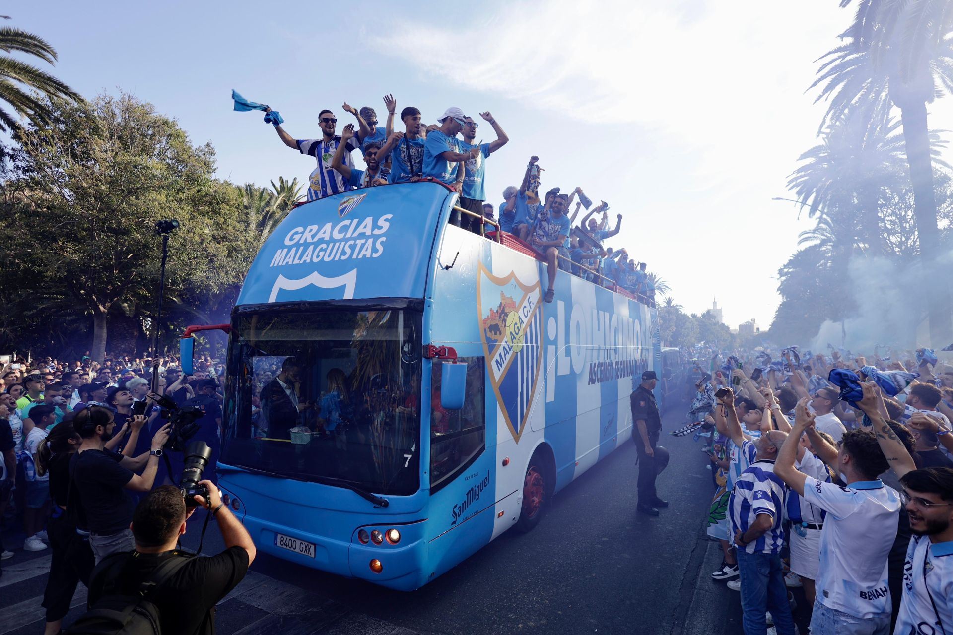 Fans celebrate Malaga CF's promotion as squad take open-top bus tour, in images