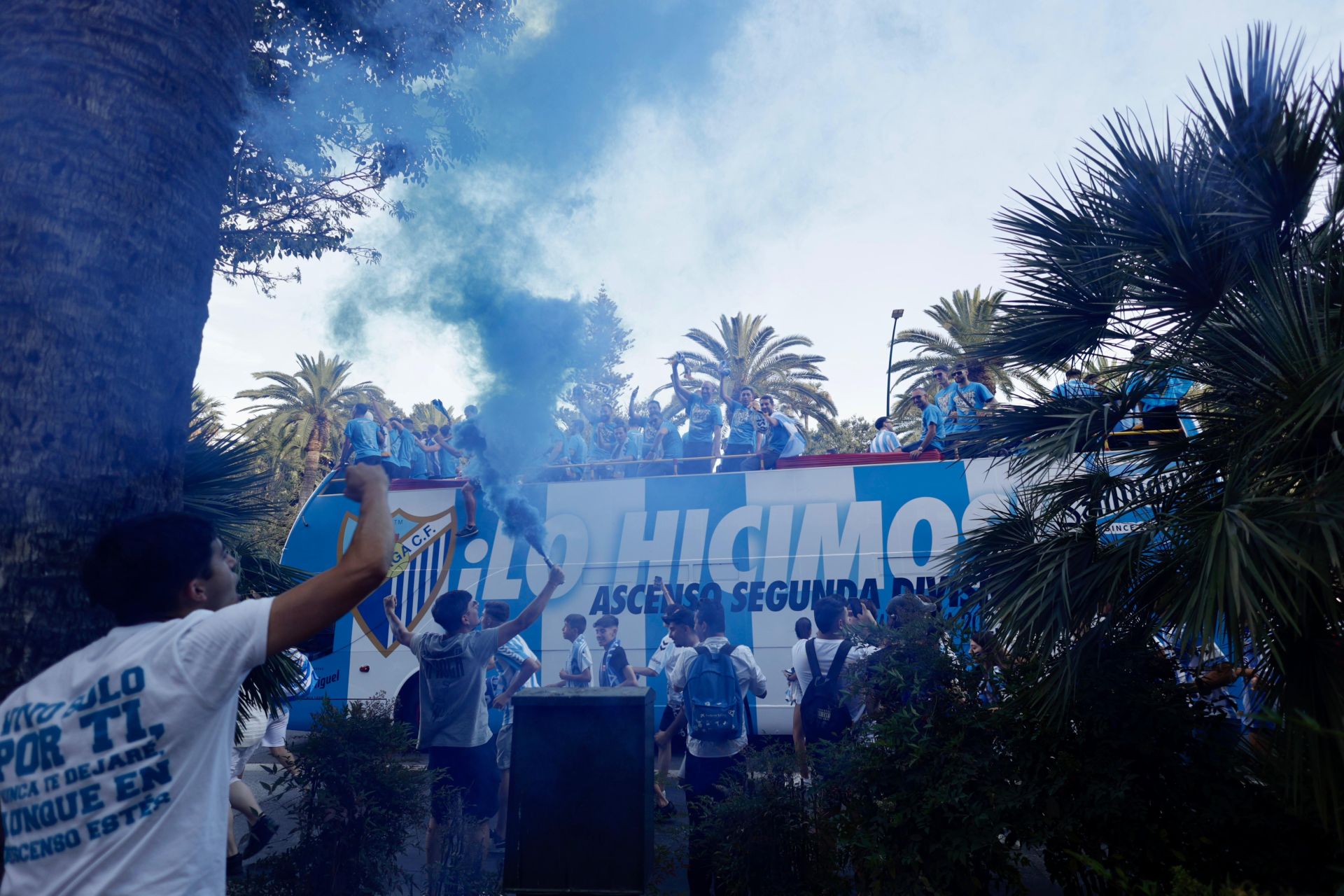 Fans celebrate Malaga CF's promotion as squad take open-top bus tour, in images