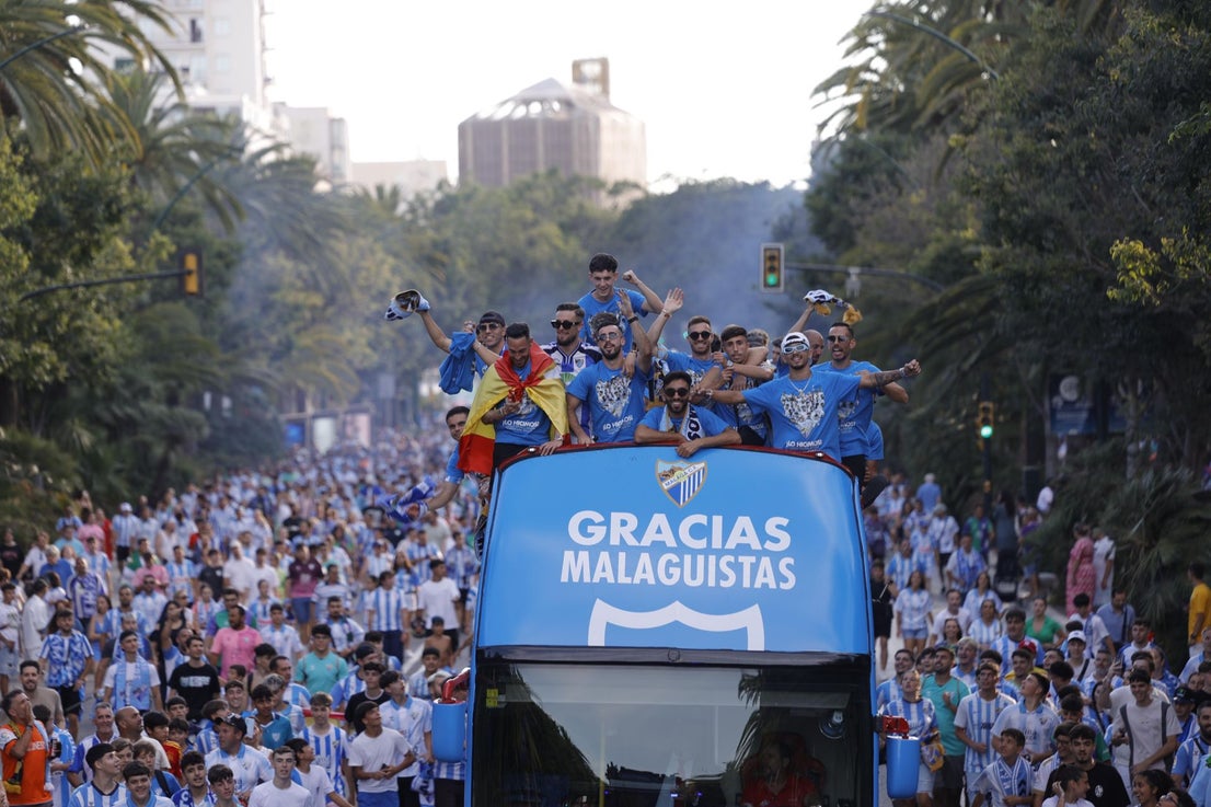 Fans celebrate Malaga CF's promotion as squad take open-top bus tour, in images