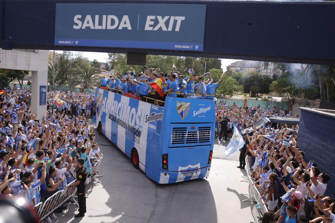 Fans celebrate Malaga CF's promotion as squad take open-top bus tour, in images
