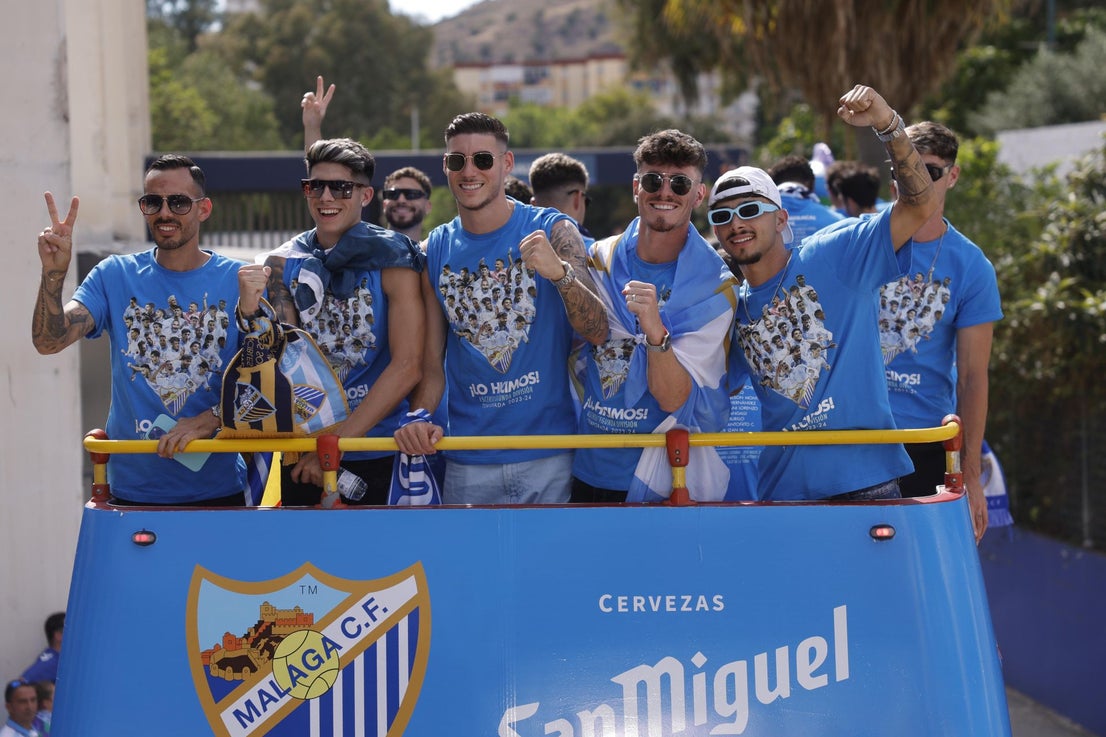 Fans celebrate Malaga CF's promotion as squad take open-top bus tour, in images