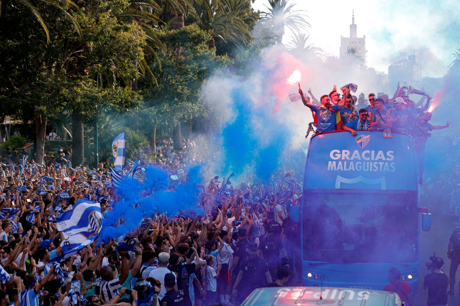 Fans celebrate Malaga CF's promotion as squad take open-top bus tour, in images