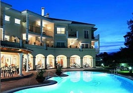 Exterior and pool area of the Tamisa Golf Hotel in Mijas.