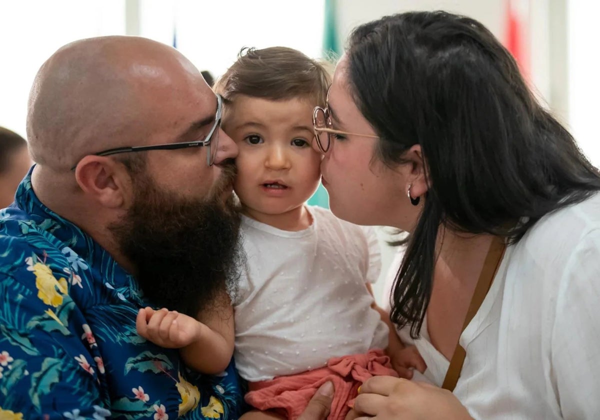 Nabila and her parents.