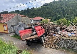 The tractor crashed into a granary which collapsed.