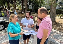 Mula and Sánchez next to the park area.