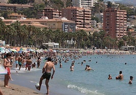 View of the beaches of Malaga with tourists and locals enjoying the sea.