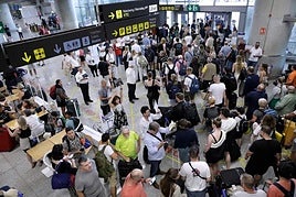 Passengers arriving at malaga airport.