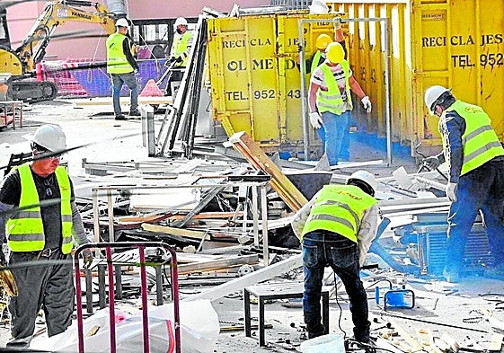 Workers on site at a recycling company.