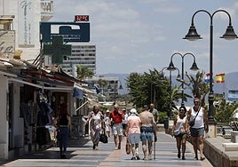 People out for a stroll in Torremolinos.