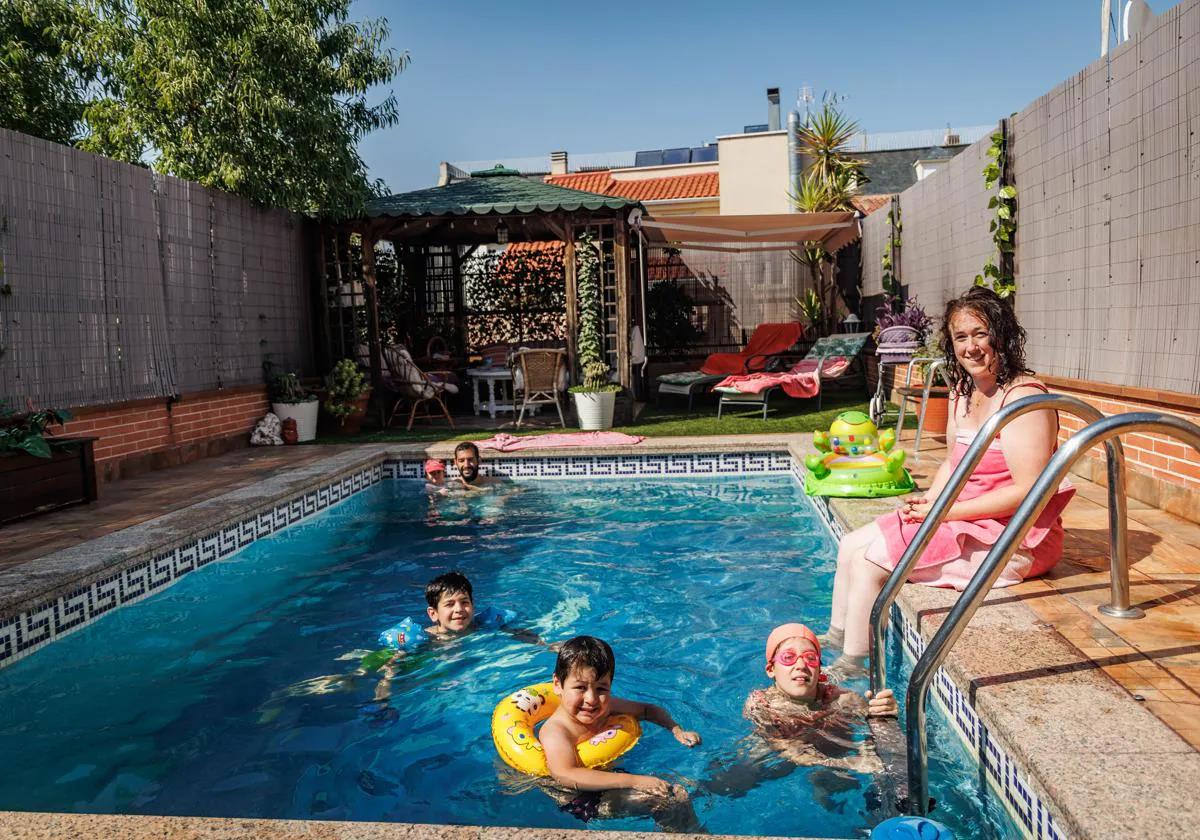 The family enjoying the use of Mercedes' pool.