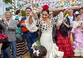 Dancing sevillanas is popular at the Andalusian fairs.